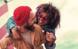 Happy couple in the sun together