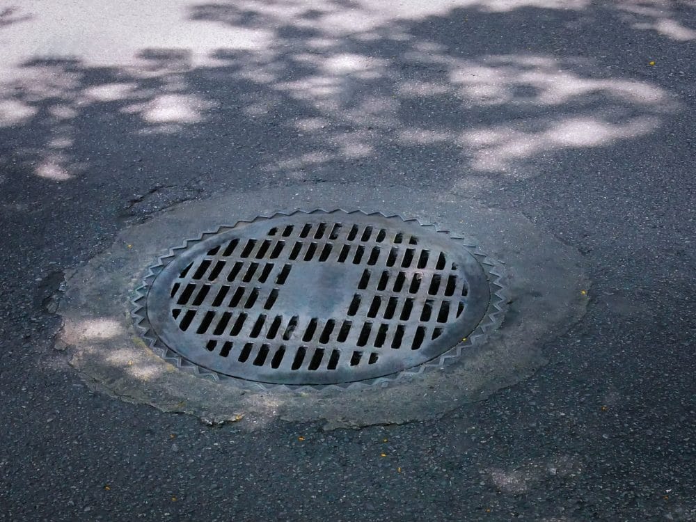 A sewer manhole cover