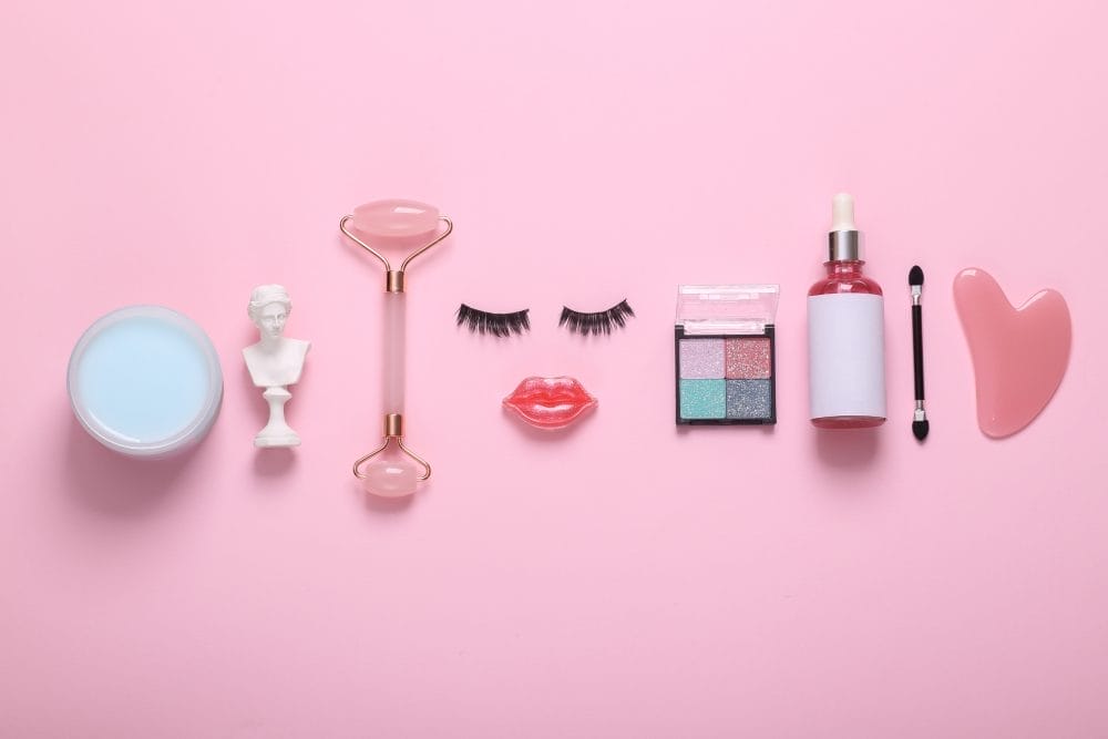 Beauty products on a pink background