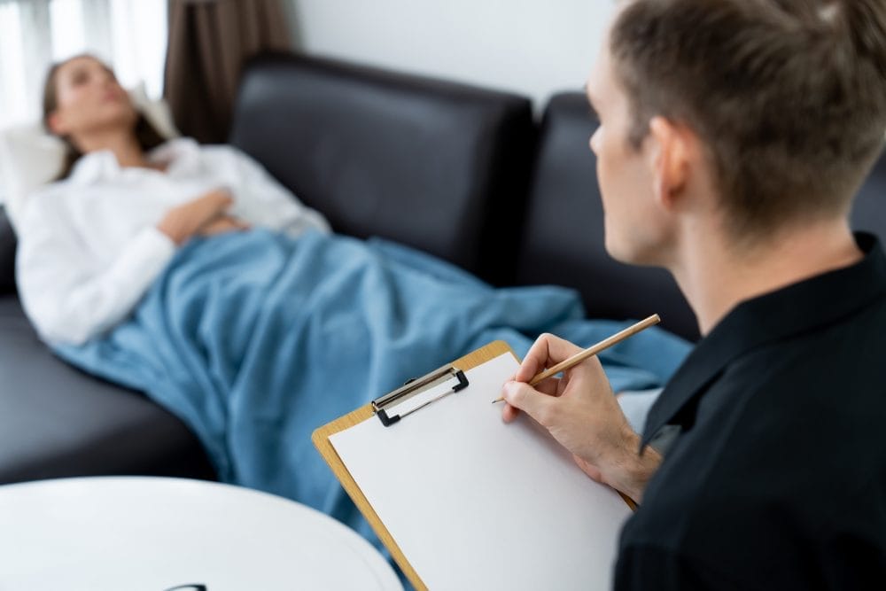Woman laying down in a therapy session