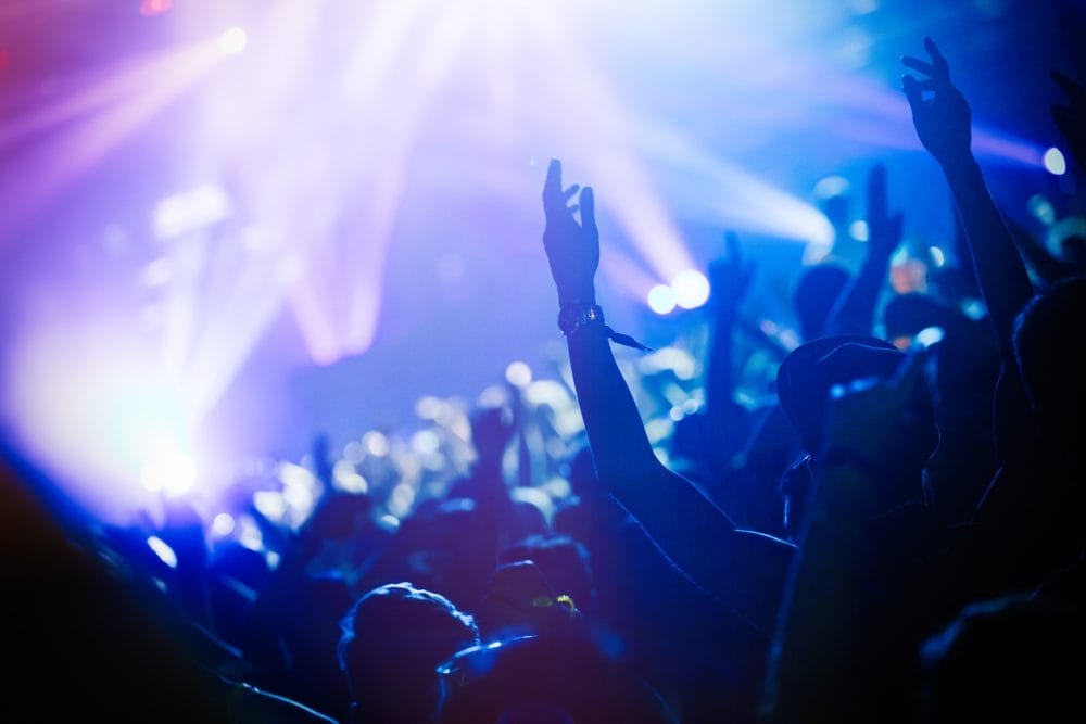 A bunch of people at a club, enjoying the nightlife