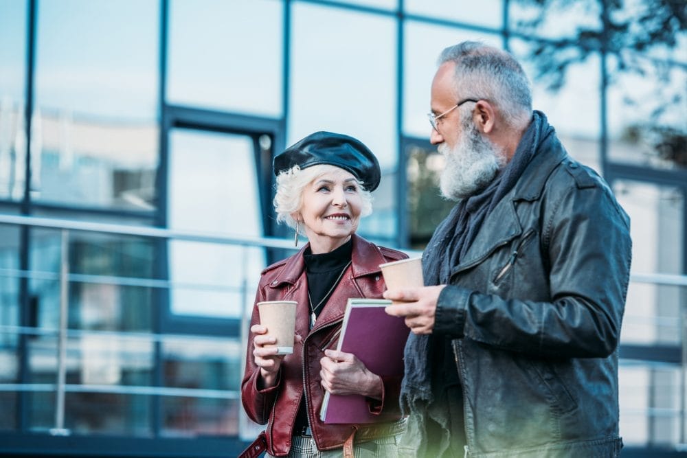 Stylish senior couple on street