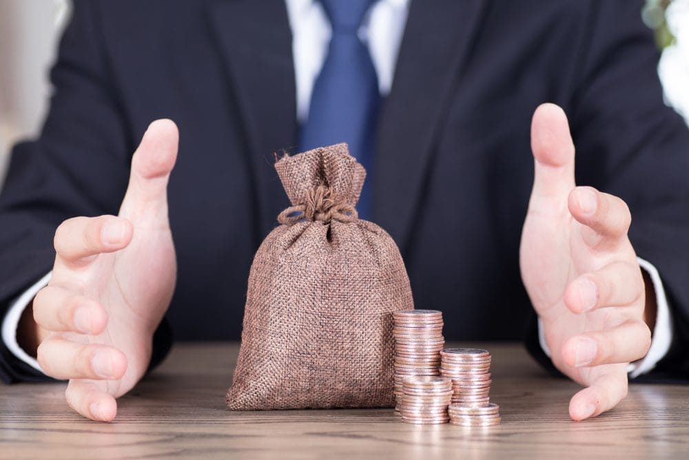 A man with coins after a bad investment