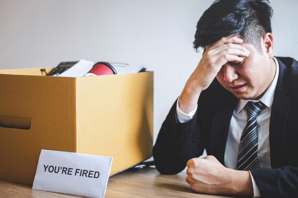 A stressed man fired from his job
