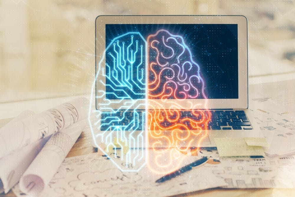 A laptop computer with a graphic of a brain in front of it