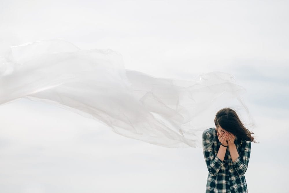 A sad woman who has been left by her boyfriend