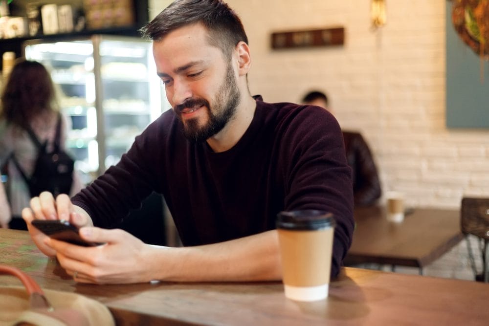 A man texting on his phone