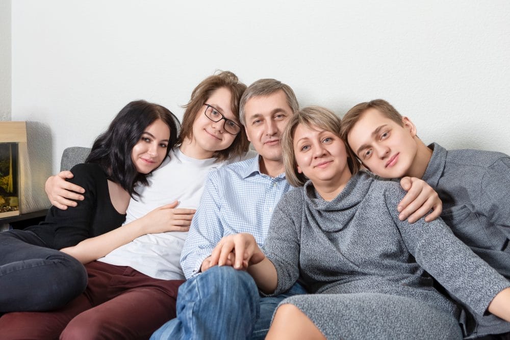 A smiling and seemingly happy family. Sadly, many adult chilren are realizing their parents never loved them