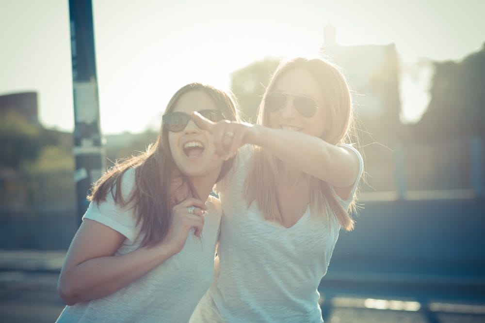 Two young female friends having a good time together