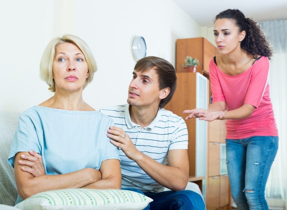 Frustrated family members arguing over financial boundaries