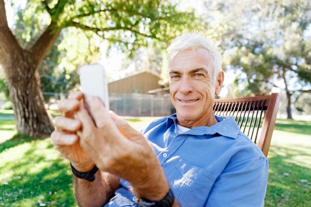 A senior citizen using a smartphone
