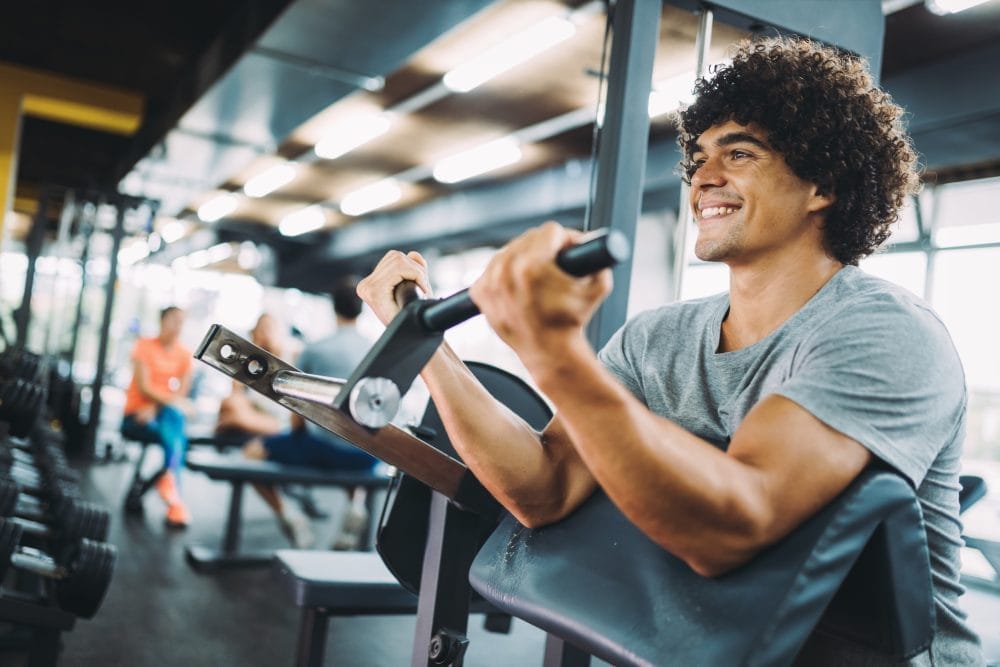 Young man working out in a gym