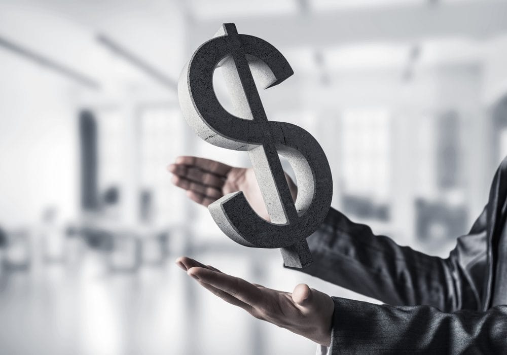 A big dollar sign symbolizing someone getting a raise at work