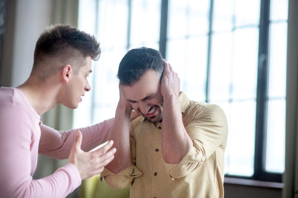 A couple of men aruging in public
