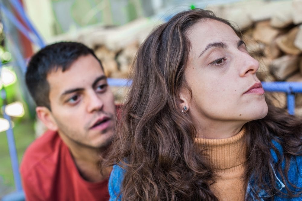 A woman who is being treated like an enemy by her former friend