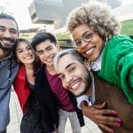 A group of millennials hanging out together