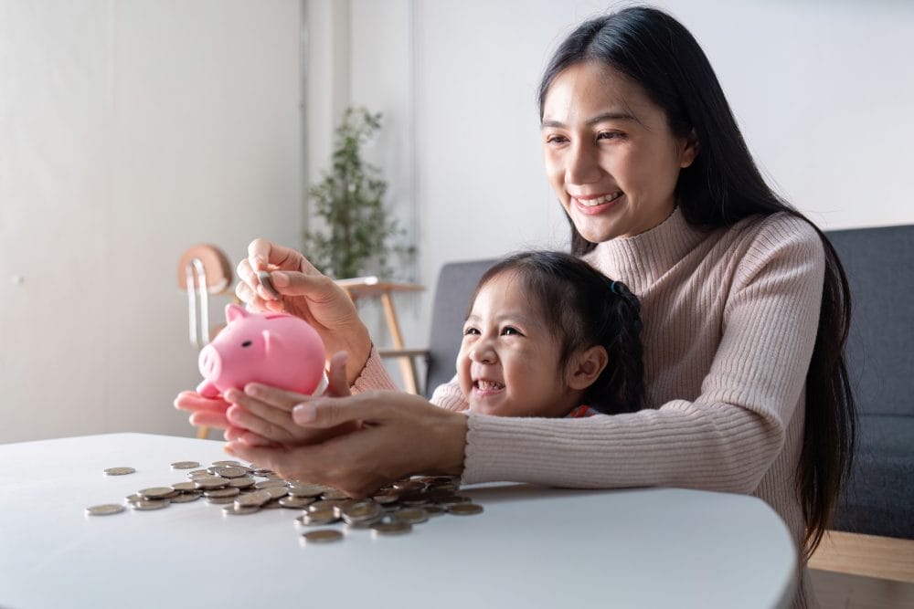 A mother teaching her daughter wealth secrets that are often kept hidden