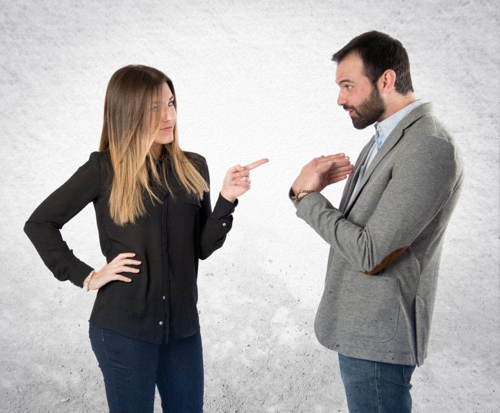 A woman blaming a man for her own actions, which makes her seem less trustworthy