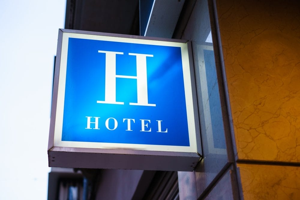 A hotel sign. Hotels are often family businesses that end in lawsuits and betrayal