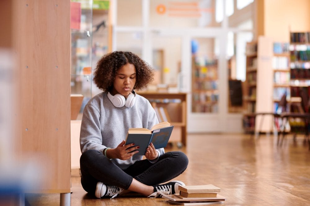 A student attempting to read at an education center