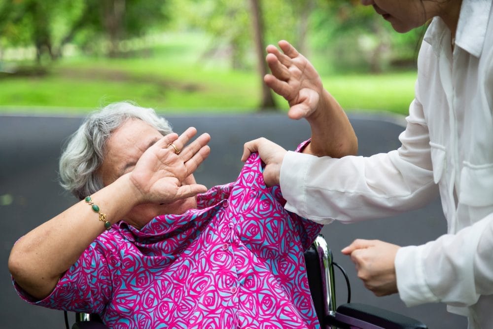 A senior woman experiencing elder abuse