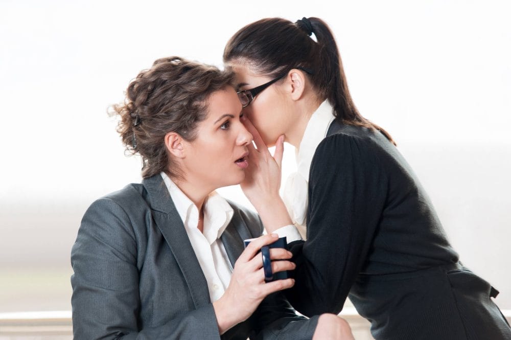 Someone spreading gossip at their job