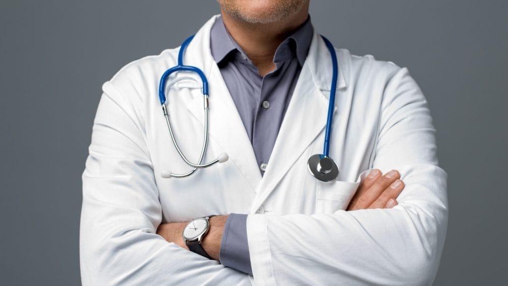 A doctor or medical expert, who is surely giving guidelines to patients.