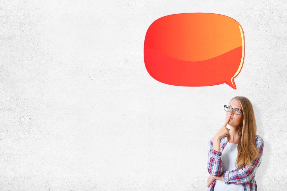 A woman thinking about speaking up about something